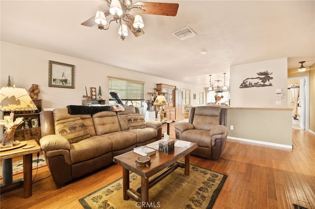 living room with light hardwood / wood-style floors