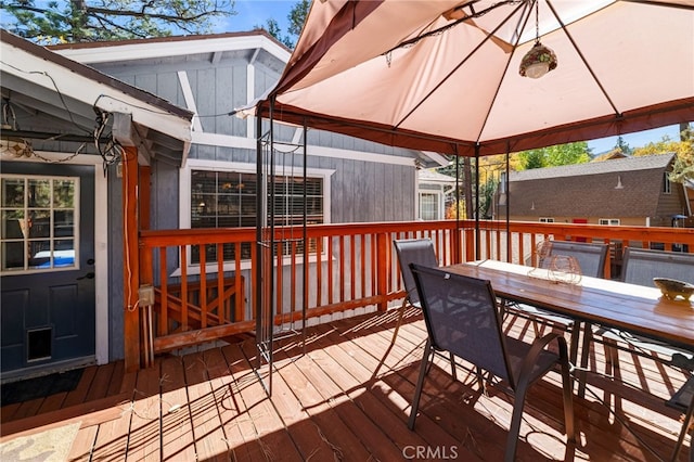 wooden deck with a gazebo