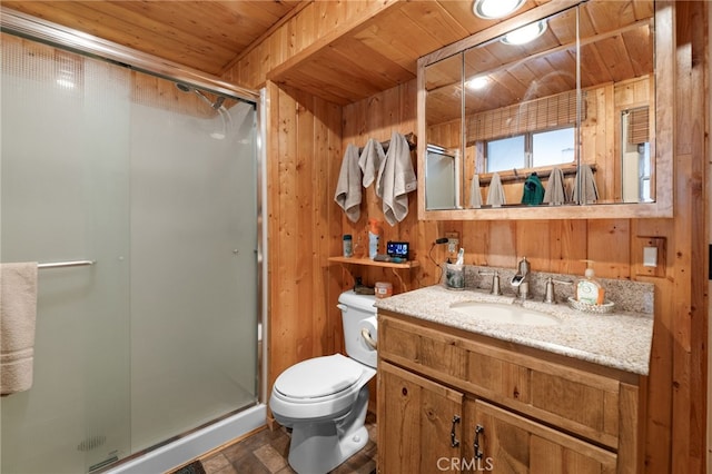 bathroom with wooden ceiling, walk in shower, toilet, wooden walls, and vanity