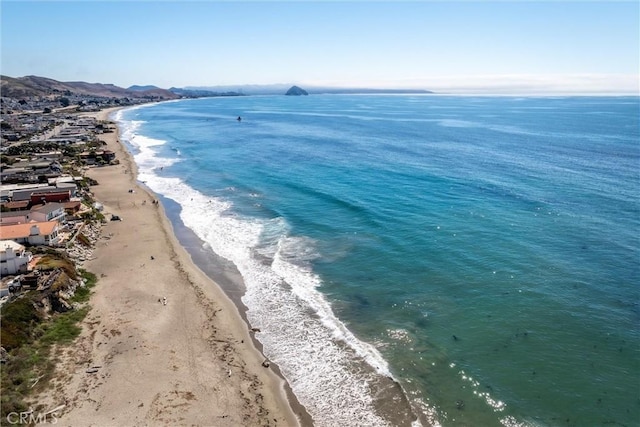 property view of water featuring a view of the beach