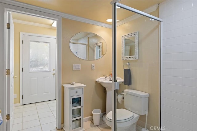 bathroom with toilet, tile patterned flooring, walk in shower, and crown molding