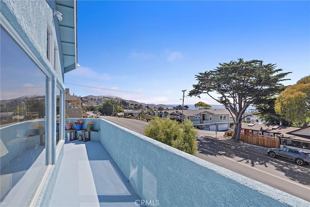 balcony featuring a mountain view