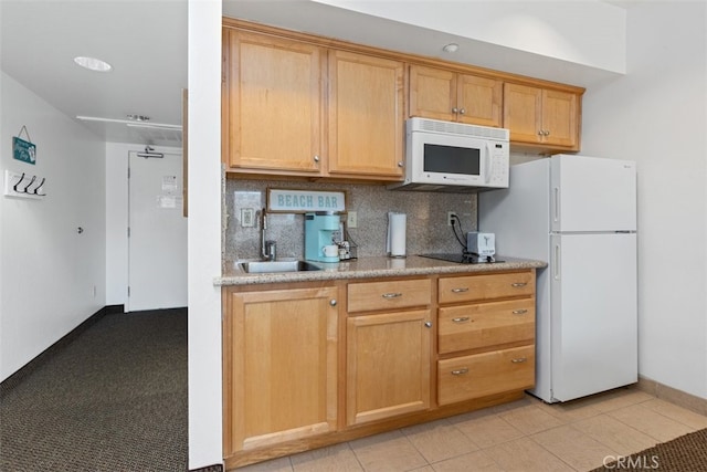 kitchen featuring backsplash, white appliances, sink, and light tile patterned floors