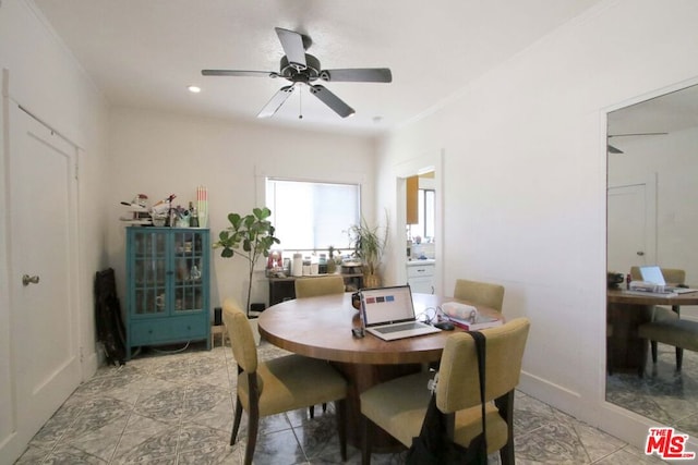 dining space featuring light tile patterned floors, ceiling fan, and crown molding