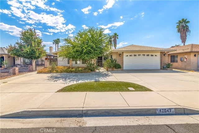 obstructed view of property featuring a garage