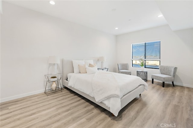 bedroom featuring light wood-type flooring