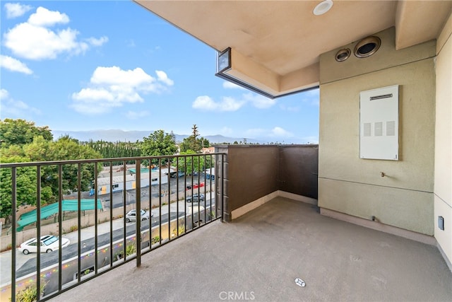 balcony featuring a mountain view