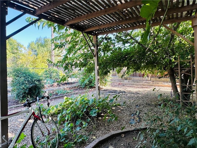27358 Comwell St, Menifee, CA 92586 - view of yard featuring a pergola and a fenced backyard