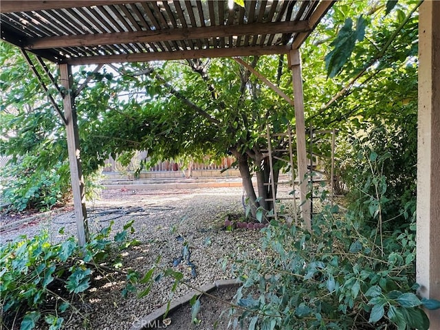 27358 Comwell St, Menifee, CA 92586 - view of yard featuring fence and a pergola