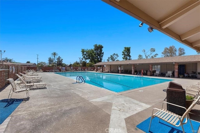 27358 Comwell St, Menifee, CA 92586 - pool with a patio and fence