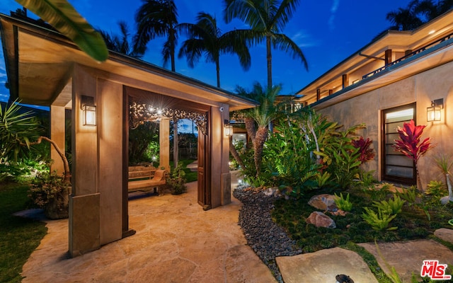 view of patio at twilight