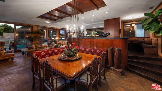 dining area featuring a chandelier