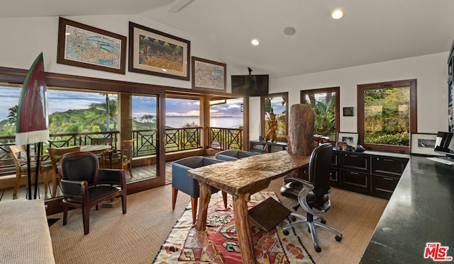 home office featuring vaulted ceiling