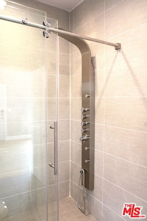 bathroom featuring walk in shower