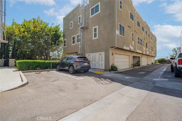 view of building exterior featuring a garage