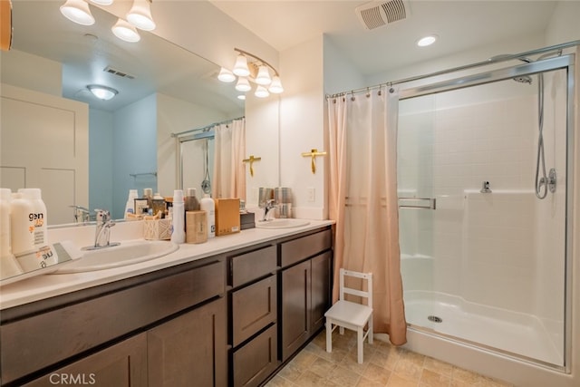 bathroom with vanity and a shower with curtain