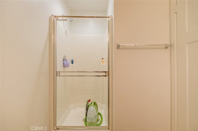 bathroom featuring an enclosed shower