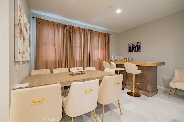 dining room with bar area