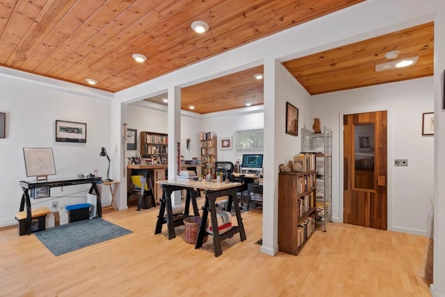 dining space with light hardwood / wood-style flooring and wooden ceiling