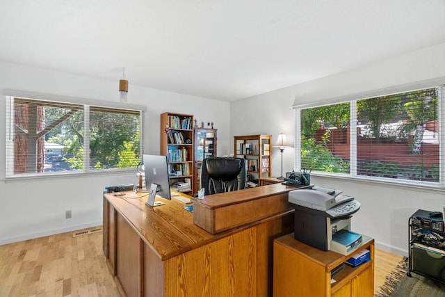 home office featuring light wood-type flooring