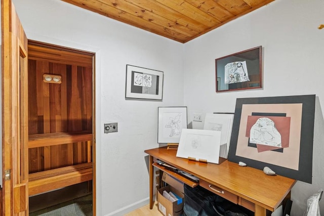 office featuring wood ceiling and light hardwood / wood-style floors