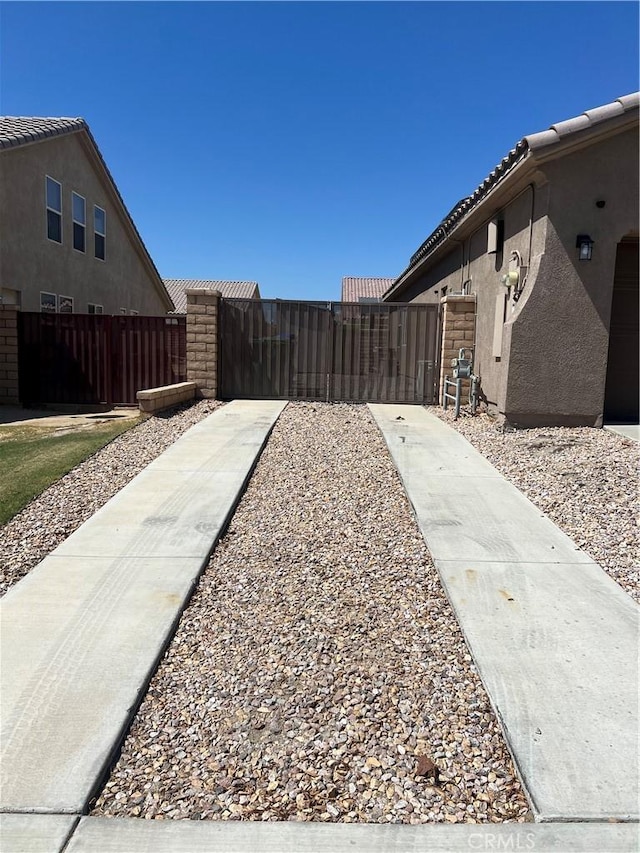 41097 Maiden Ct, Indio, CA 92203 - view of yard featuring a gate