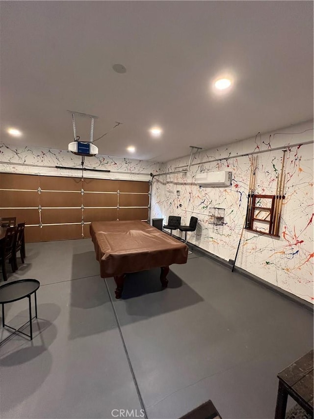 41097 Maiden Ct, Indio, CA 92203 - playroom with an AC wall unit, finished concrete floors, billiards, wallpapered walls, and recessed lighting