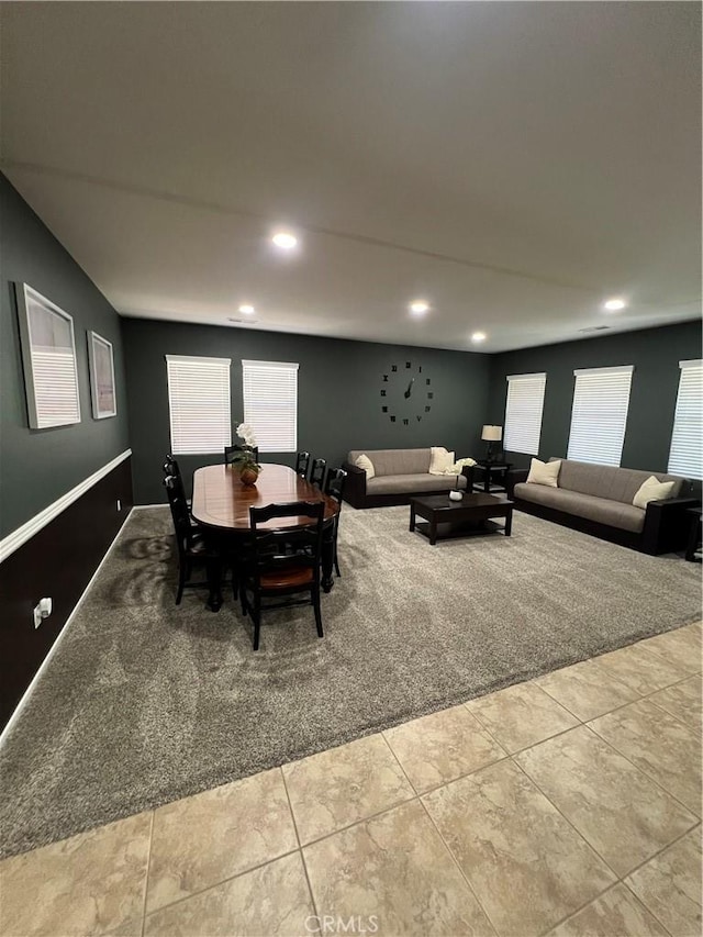 41097 Maiden Ct, Indio, CA 92203 - carpeted dining space featuring healthy amount of natural light, recessed lighting, and tile patterned flooring