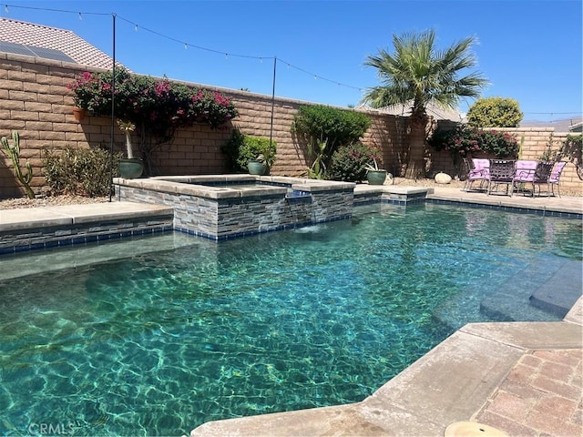 41097 Maiden Ct, Indio, CA 92203 - view of swimming pool with a fenced backyard and a pool with connected hot tub