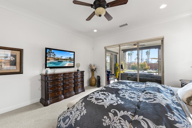 carpeted bedroom with ceiling fan, ornamental molding, and access to outside