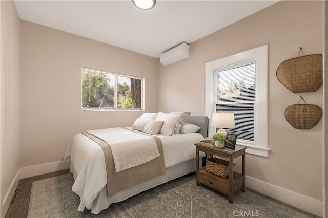 bedroom with a wall unit AC