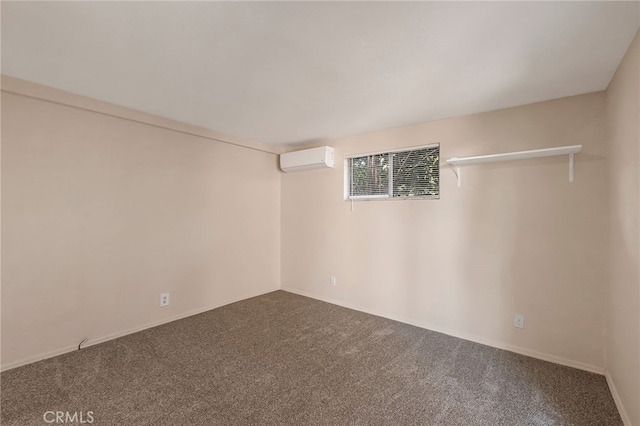 unfurnished room featuring carpet floors and a wall mounted air conditioner