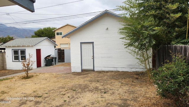 back of house with a patio area