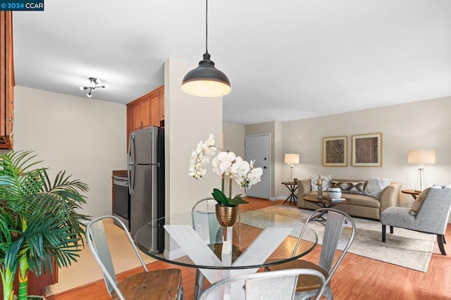 dining room featuring light hardwood / wood-style floors