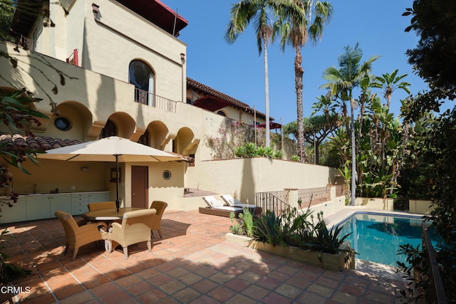 view of pool with a patio