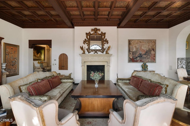 living room with coffered ceiling and wooden ceiling