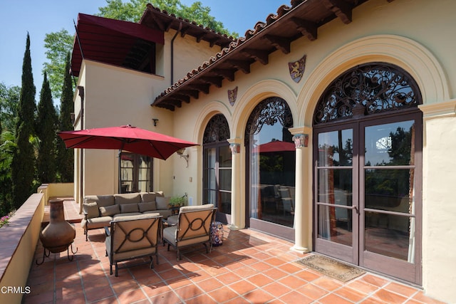 view of patio / terrace featuring an outdoor hangout area and french doors