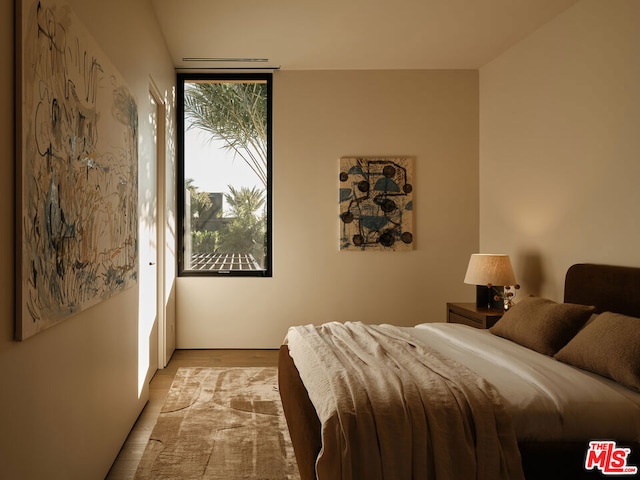 bedroom featuring light hardwood / wood-style floors