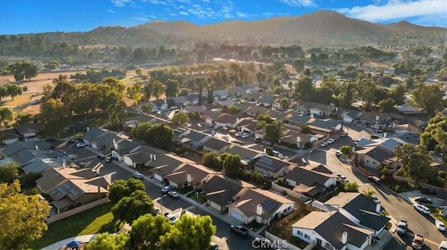 birds eye view of property featuring a mountain view