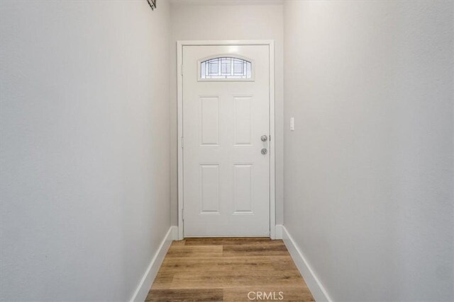 doorway featuring light hardwood / wood-style flooring