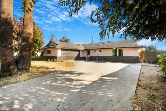 single story home with a garage