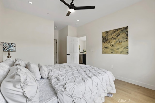 bedroom featuring light wood-type flooring and ceiling fan