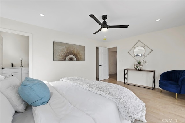 bedroom featuring light wood-type flooring and ceiling fan