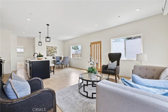 living room with light hardwood / wood-style flooring