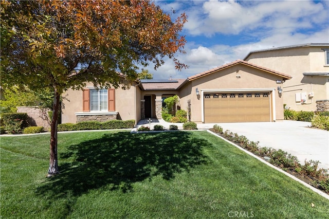 view of front of property with a garage and a front yard