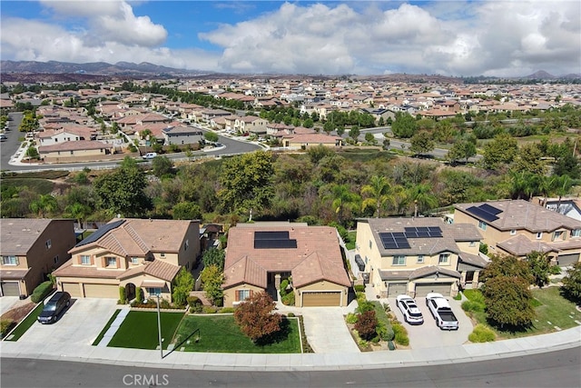 drone / aerial view featuring a mountain view