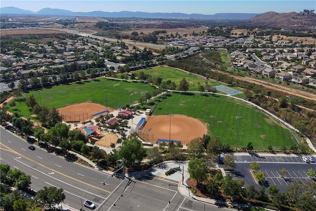 birds eye view of property featuring a mountain view