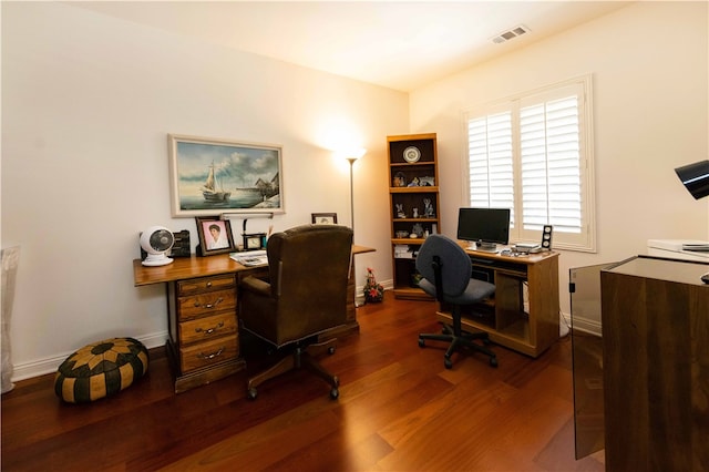 home office with hardwood / wood-style flooring