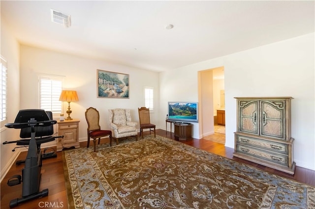 interior space with dark hardwood / wood-style floors