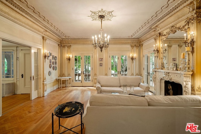 unfurnished living room featuring parquet floors, ornamental molding, an inviting chandelier, and french doors